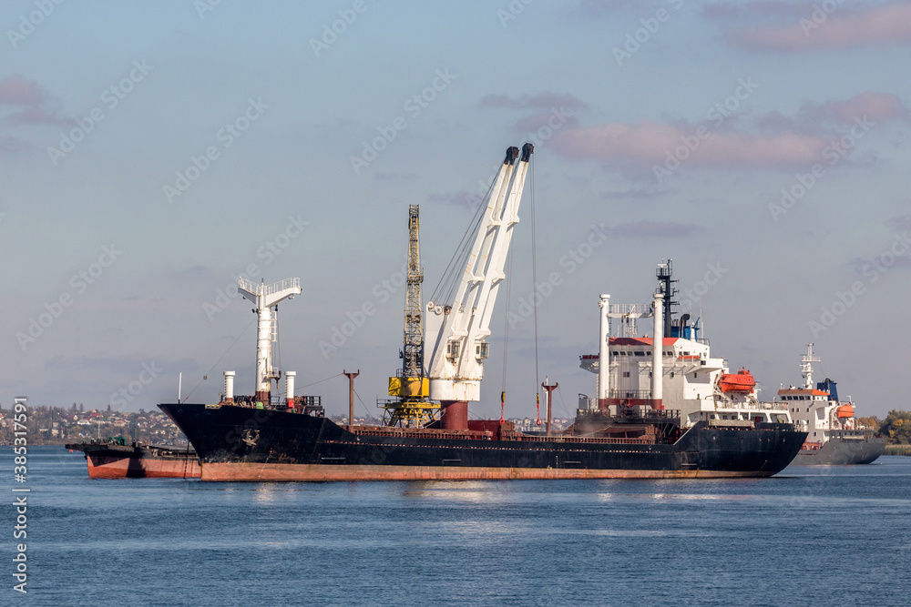  large dry cargo ship on the roadstead of the Dnieper river