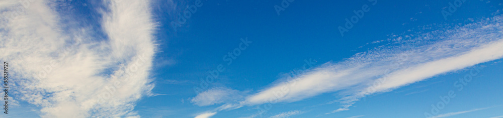 Image of a partly cloudy and partly clear sky during the day Image of a partly cloudy and partly clear sky during the day
