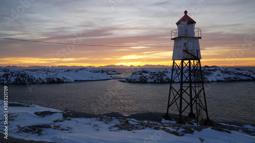 Lighthouse at Henningsvaer Football Stadium during sunrise on the Lofoten Islands in Norway.