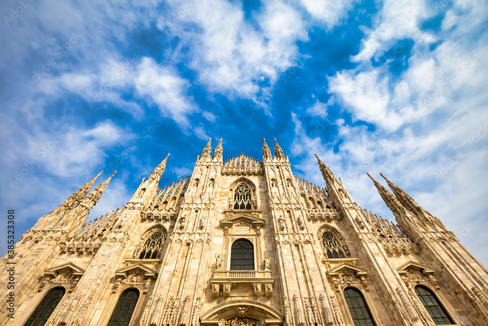 Milan Cathedral (Duomo di Milano) with blue sky and sunset light - obrazy, fototapety, plakaty 