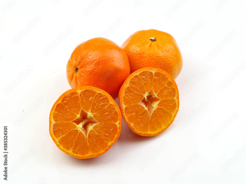 Orange fruits and sliced, isolated on a white background. Antioxidants, high vitamin C and collagen Orange fruits and sliced, isolated on a white background. Antioxidants, high vitamin C and collagen