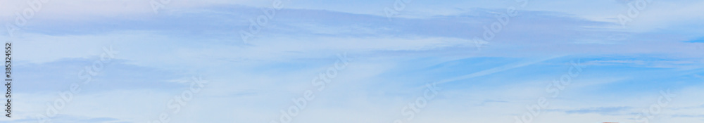 Image of a partly cloudy and partly clear sky during the day Image of a partly cloudy and partly clear sky during the day
