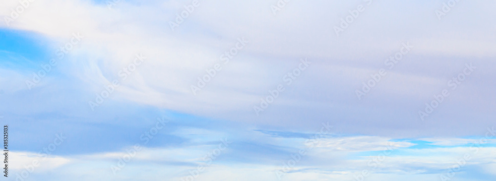 Image of a partly cloudy and partly clear sky during the day Image of a partly cloudy and partly clear sky during the day