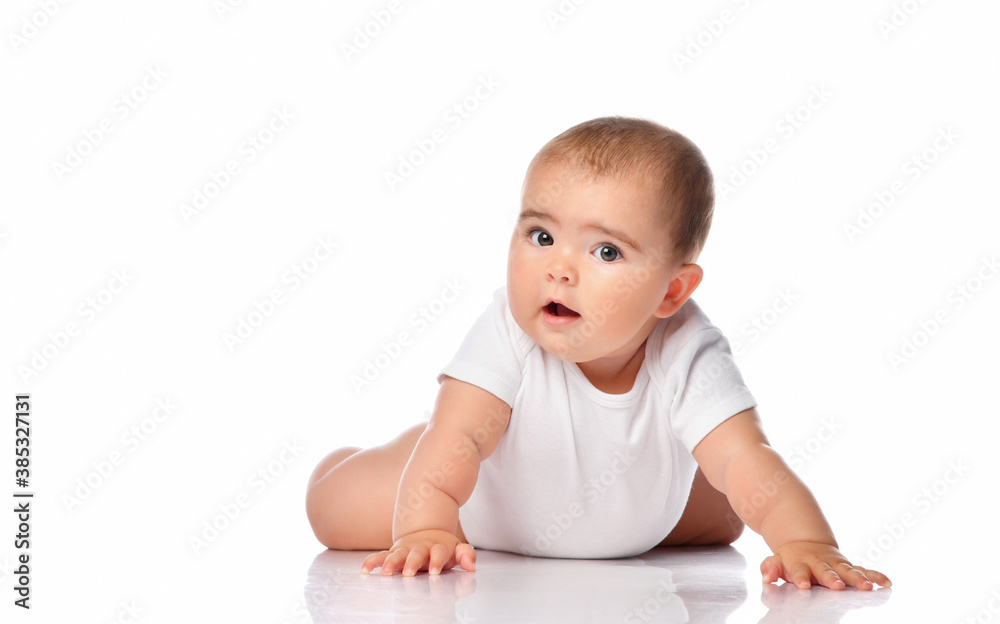 Portrait of a concerned baby girl with brown eyes on a white background. Portrait of a concerned baby girl with brown eyes on a white background.