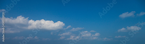 Image of a partly cloudy and partly clear sky during the day