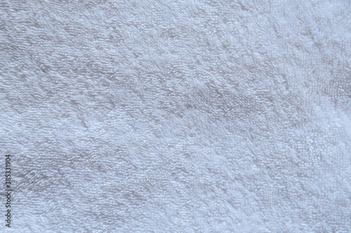 Close - up white texture of natural towel for background.