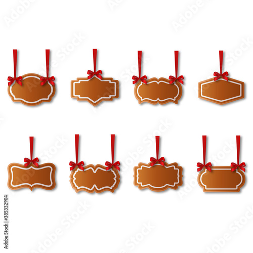 set of gingerbread labels with red ribbons. christmas elements
