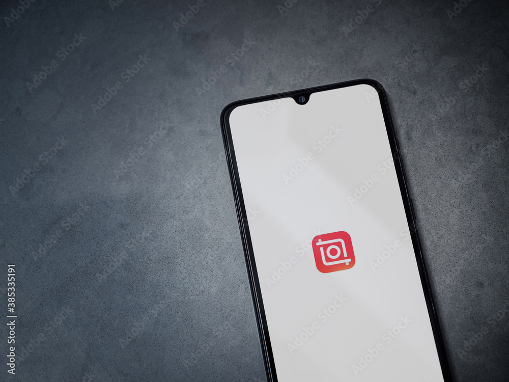 InShot - Video Editor and Movie Maker app launch screen with logo on the  display of a black mobile smartphone on a dark marble stone background  Stock Photo | Adobe Stock