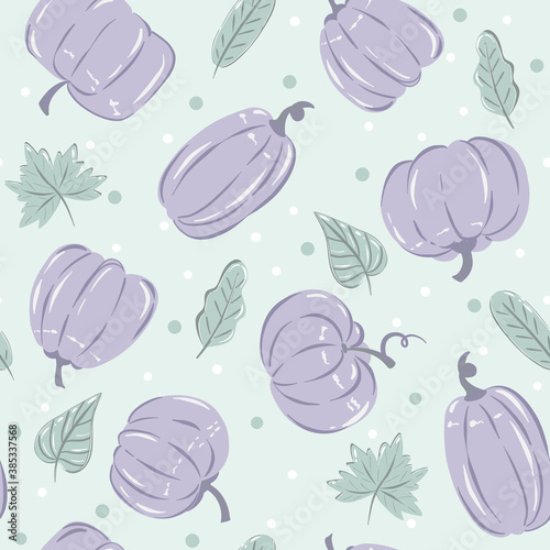 Seamless pattern with handdrawn green leaves and purple pumpkins.