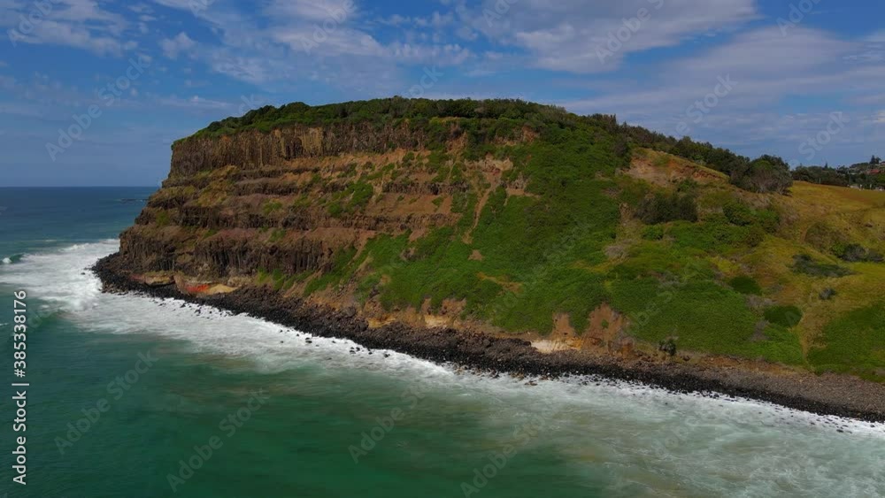 Turquoise waves by beautiful Lennox Head Mountain -NSW Australia -Aerial