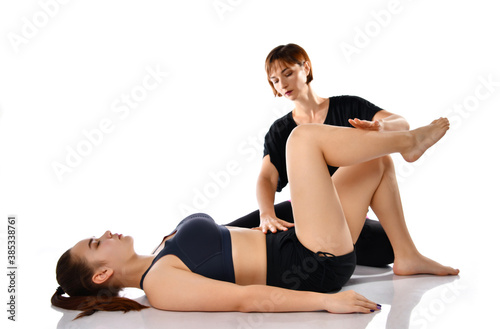 Girl training with trainer doing breathing exercise © FAB.1