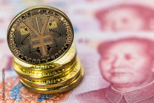 Chinese digital currency, conceptual image of the digital Yuan, or e-RMB, on old yuan banknotes