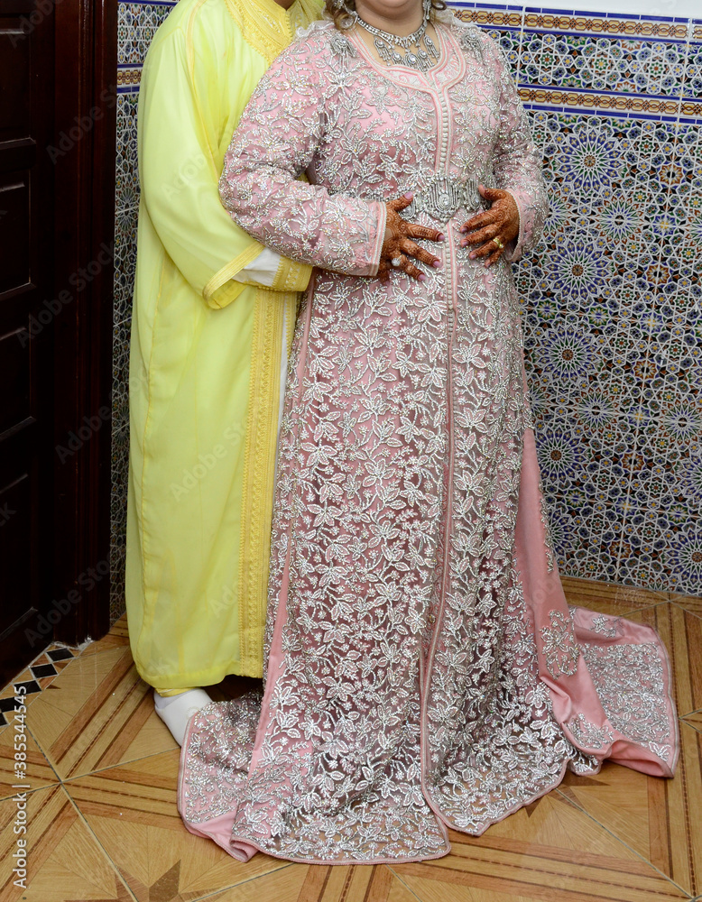 Moroccan wedding. Arab clothes. Kaftan Emirates. Bride and groom