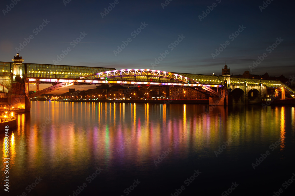Andreyevsky Pushkinsky Bridge in Moscow at evening twilight
