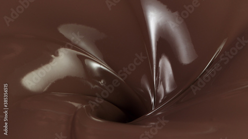 Detail of pouring hot chcocolate with splash photo