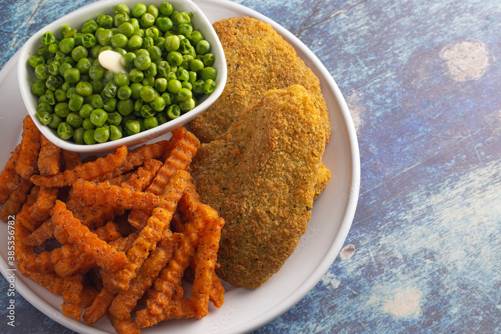 Meal of Breaded Fish Sweet Potato Fries and Peas Meal of Breaded Fish Sweet Potato Fries and Peas