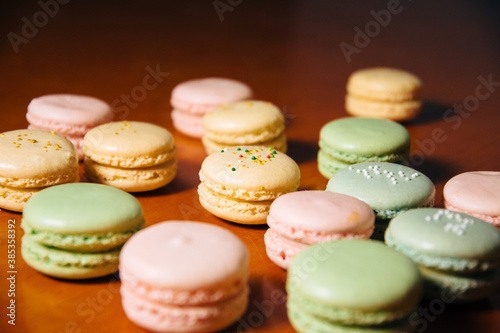 colorful cookies on a wooden table