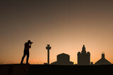 liverpool city skyline with man in front