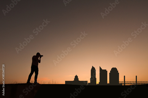 man in front of sacramento city skyline