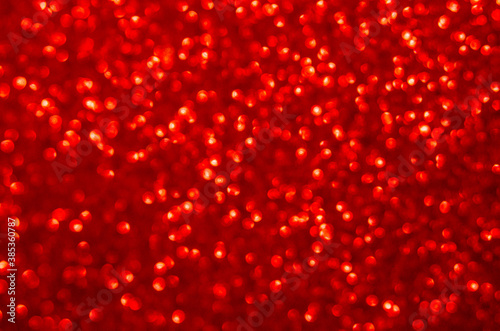 Decompressed abstract red glitter background. sparkles