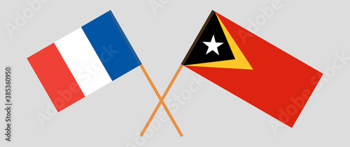Crossed flags of East Timor and France