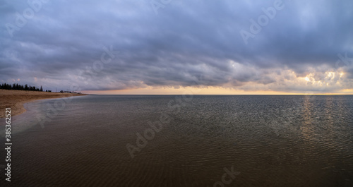 Colorful sea beach sunrise landscape (Strilkove village, Arabat Spit, Ukraine)