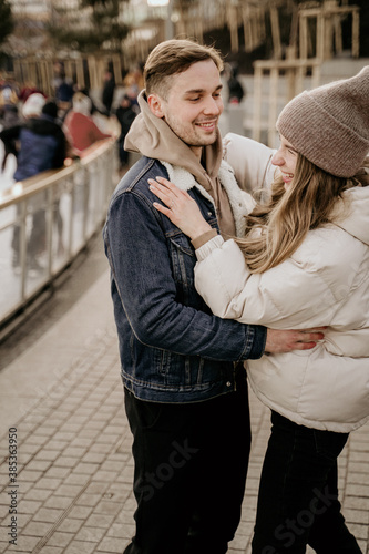 girl and boy walk outdoor in winter