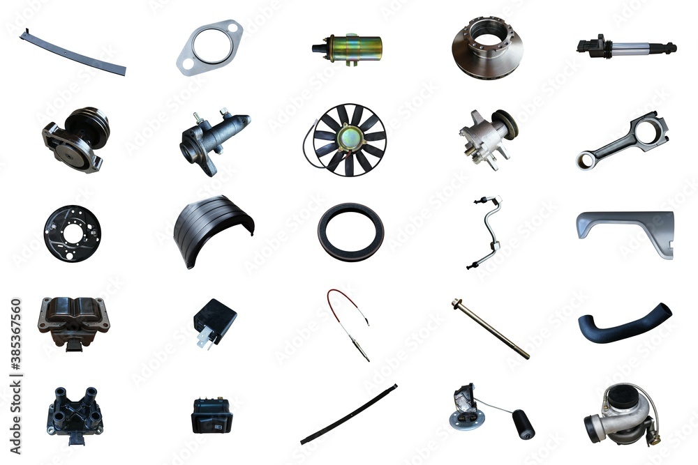 Lots of new car parts on an isolated white background. Autoshop. Lots of new car parts on an isolated white background. Autoshop.