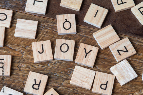 word joy wooden letters