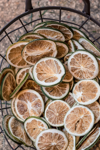 dried citrus fruits arranged in the basket
