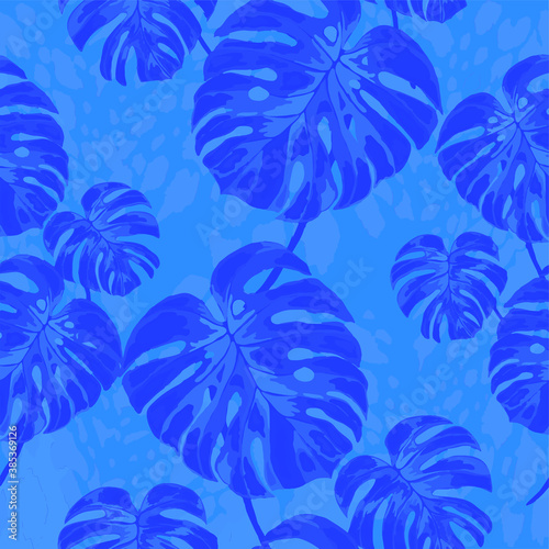 Tropical seamless pattern on animalistic texture. Jungle exotic summer print. Summer tropical leaf. Tropical flower fashion pattern. Floral tropic illustration. Vector seamless pattern.