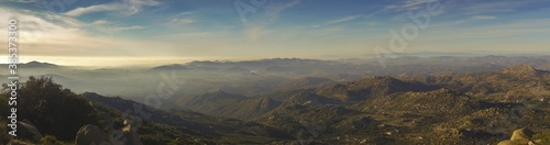 Wide Panoramic Scenic Landscape of San Diego County Inland and Distant Marine Layer over Pacific Ocean from Summit of Mount Woodson in Poway California © Autumn Sky