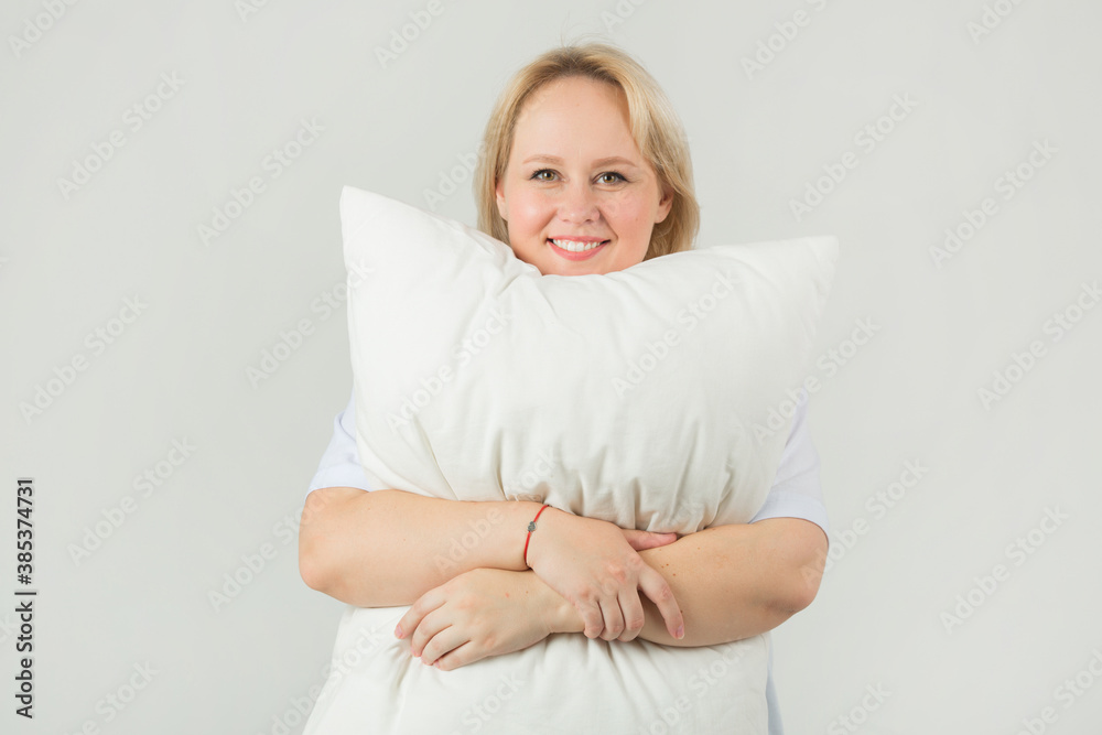 beautiful young plump female in a white t-shirt on a white background beautiful young plump female in a white t-shirt on a white background