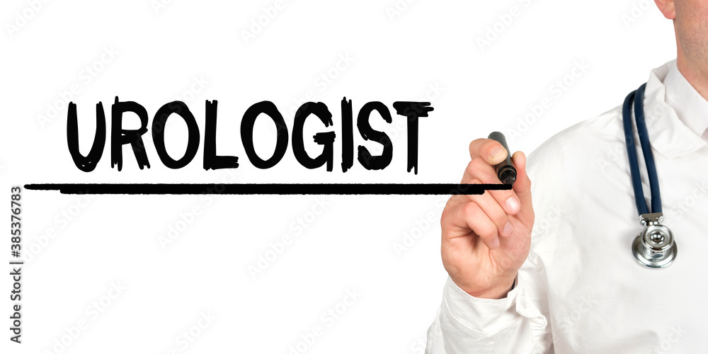 Doctor writes the word - UROLOGIST. Image of a hand holding a marker isolated on a white background. Doctor writes the word - UROLOGIST. Image of a hand holding a marker isolated on a white background.