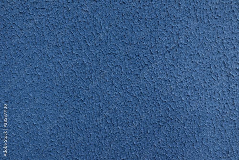 Background of adhesive composition, rough, painted blue, side view Background of adhesive composition, rough, painted blue, side view