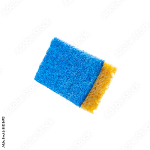 yellow washing sponge isolated on a white background. studio shot. cleaning and washing concept