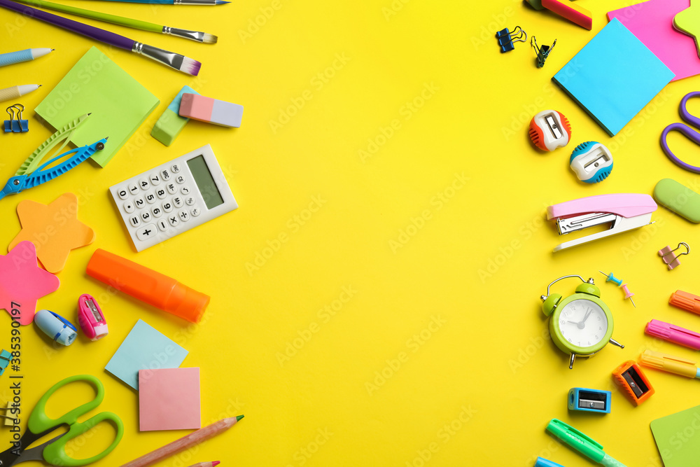 School stationery on yellow background, flat lay with space for text. Back to school