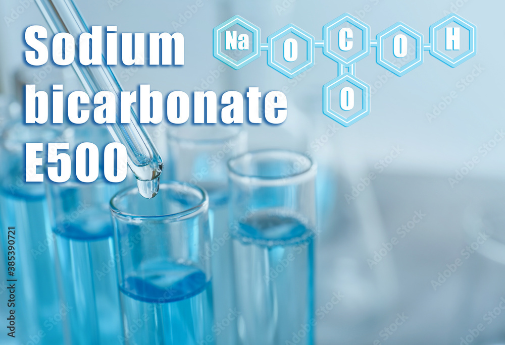 Text Sodium bicarbonate E500 with soda formula and test tubes on background Text Sodium bicarbonate E500 with soda formula and test tubes on background