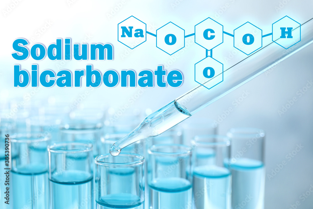 Text Sodium bicarbonate with soda formula and test tubes on background Text Sodium bicarbonate with soda formula and test tubes on background