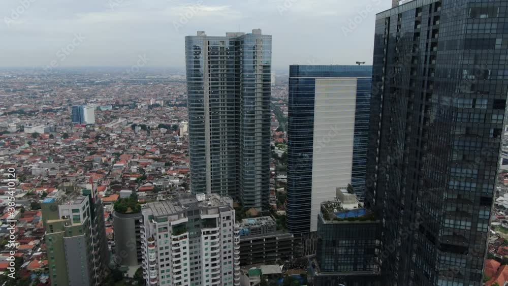 Drone shot aerial view of Tunjungan Plaza Surabaya Indonesia HD Stock Footage Highres camera track out reveals the cityscape Drone shot aerial view of Tunjungan Plaza Surabaya Indonesia HD Stock Footage Highres camera track out reveals the cityscape