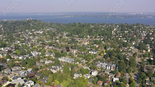 Aerial / drone footage of Lake Washington, Capitol Hill, Miller Park, Squire Park, Stevens, Bellevue  near downtown Seattle, smoke in the air from the Washington State wildfires in Seattle, Washington photo