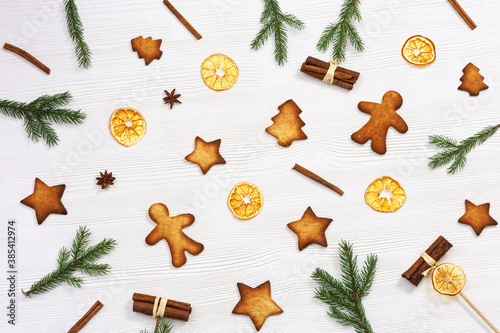 Baked Christmas ginger biscuits, traditional shape star, christmas tree, snowman, xmas sweet food background. Handmade cookies