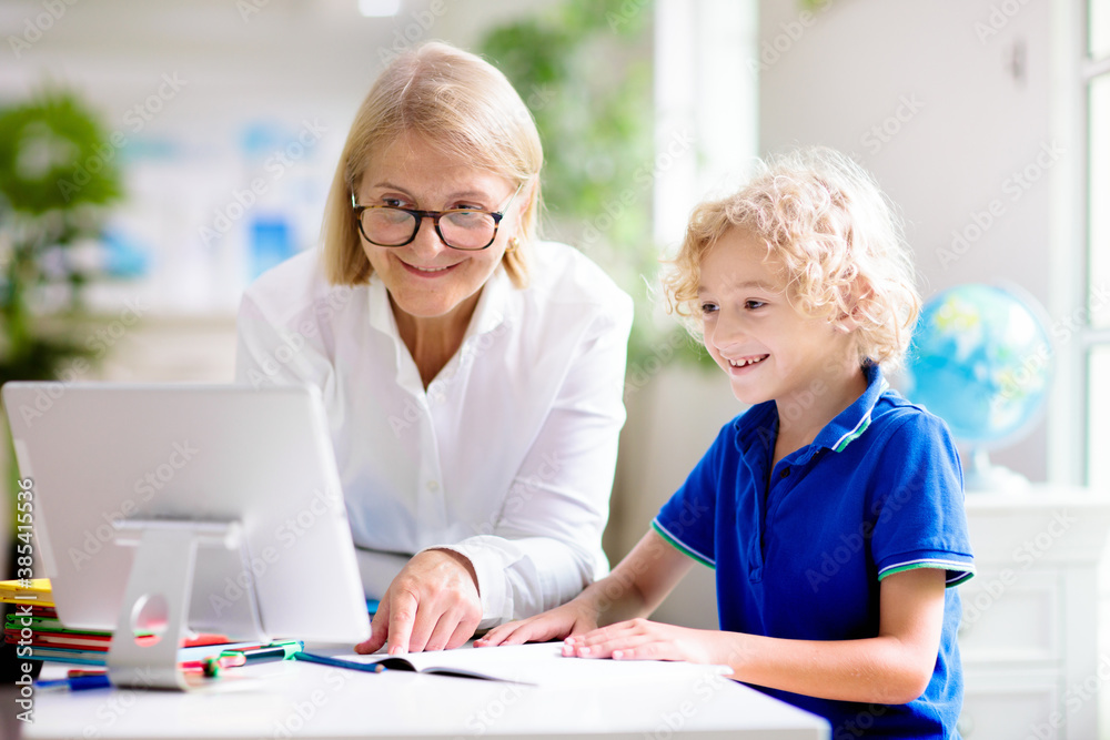 Online remote learning. School kids with computer. Online remote learning. School kids with computer.