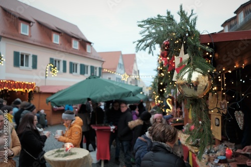 Christmas market in Germany. Christmas holidays in Germany.People at the Christmas market .Christmas and New Year in Europe.Winter holidays