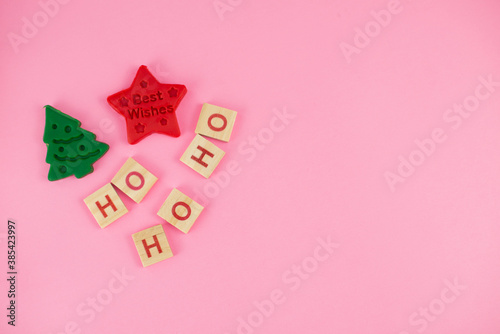 Happy New Year and Merry Christmas. Scrabble letters, playdough and plasticine. Letter tiles spelling celebration holiday.