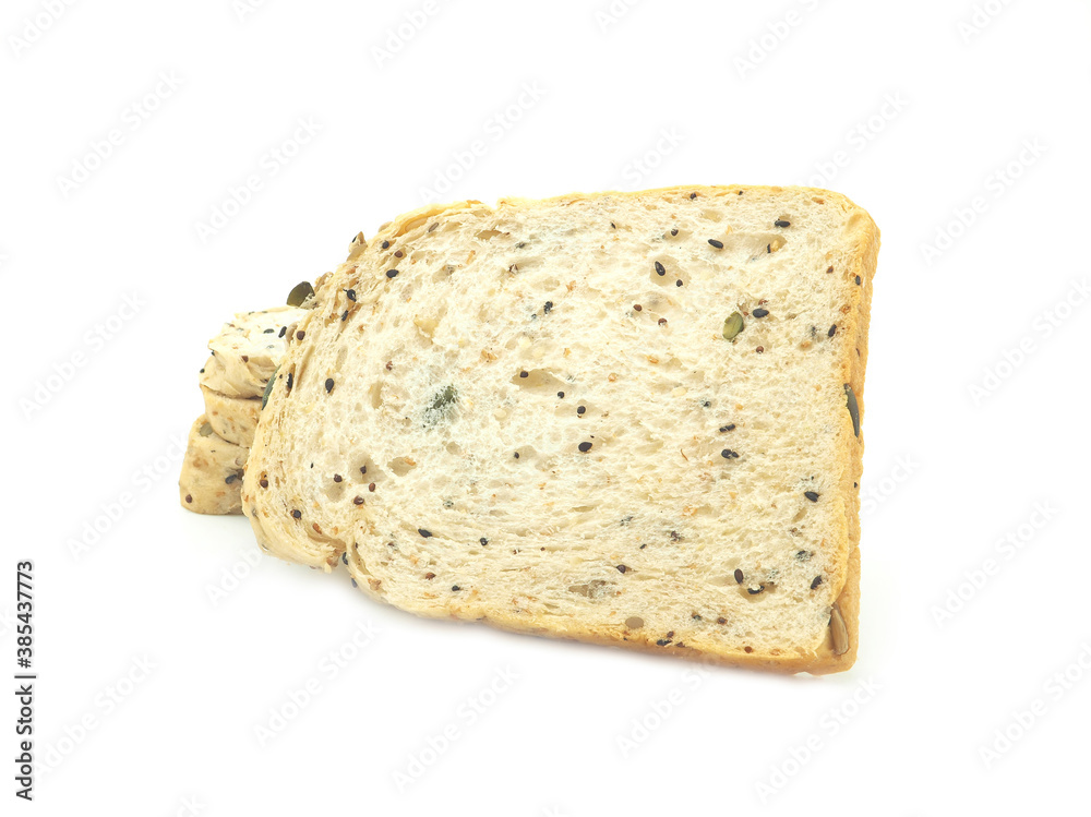 Fresh homemade slice of whole wheat bread isolated on a white background... Fresh homemade slice of whole wheat bread isolated on a white background...