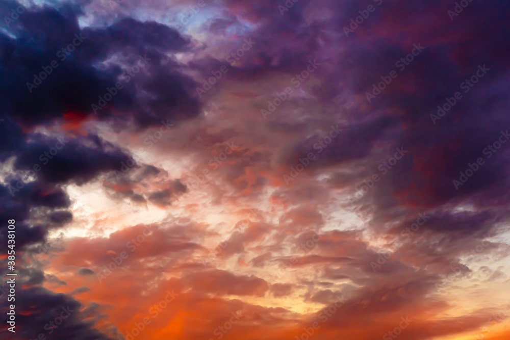 Clouds in the sky. Clouds at sunset. Sunset. The sky at sunset. Multi-colored clouds at sunset. Dark sky with clouds. Thick vapor texture. Natural abstraction. High in the sky. Dramatic background