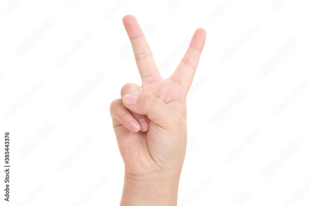 Boy's hand showing the sign of victory and peace close-up isolated on white background. Boy's hand showing the sign of victory and peace close-up isolated on white background.