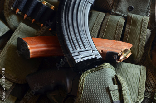 Tactical unloading vest with  magazines selective focus photo