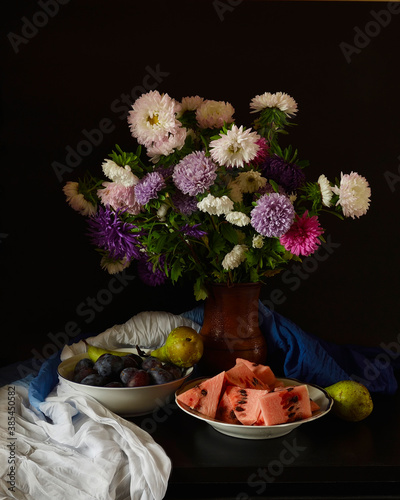 Autumn bouquet of flowers with fruits and berries.